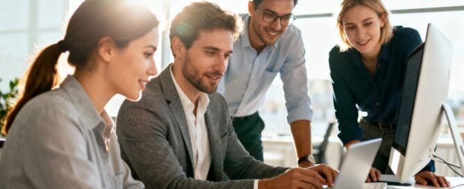 Team collaborating on Amazon advertising strategy.