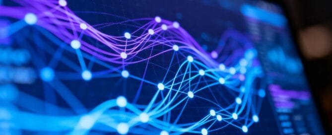 Abstract data visualizations on a digital screen.